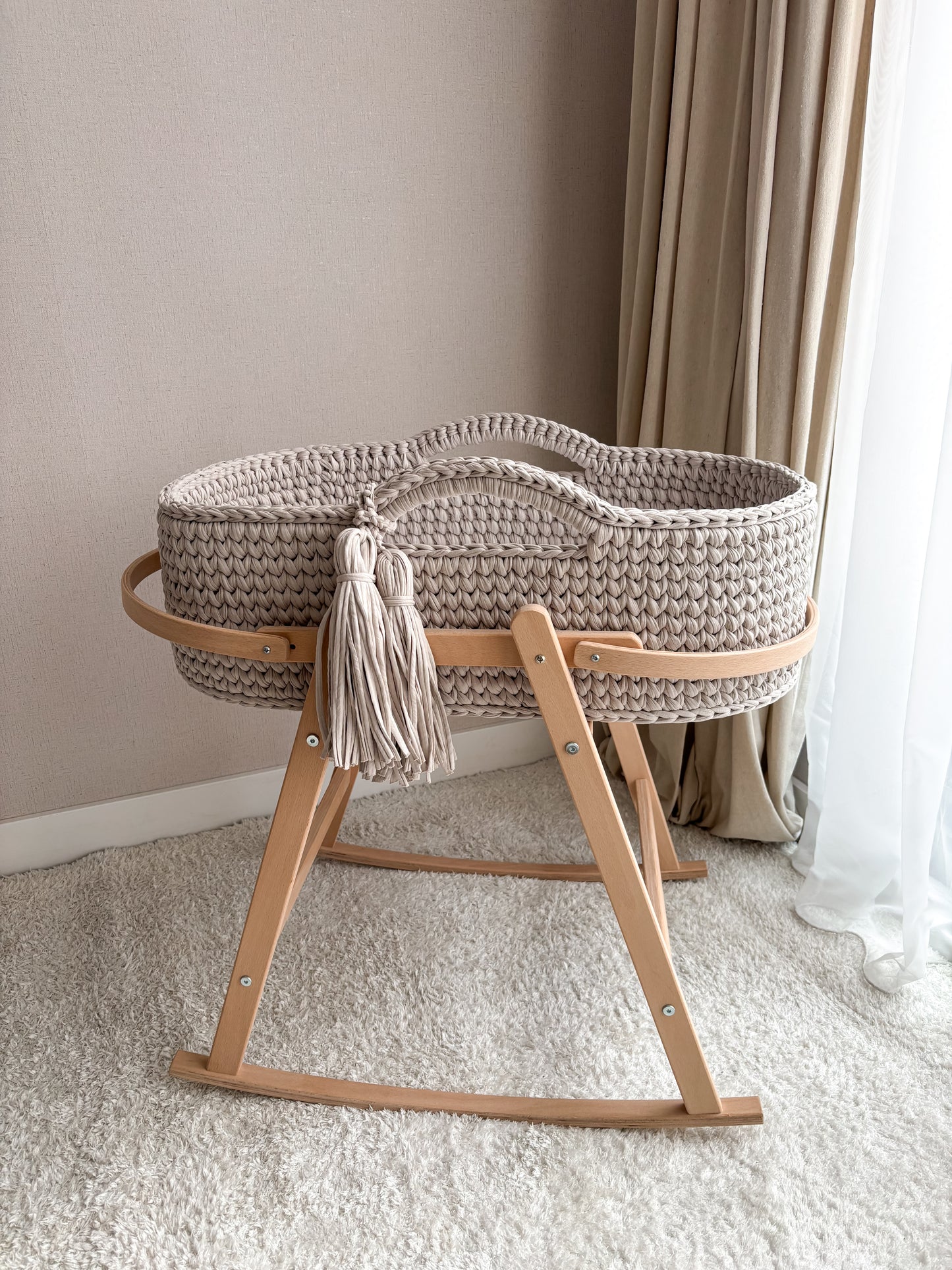 Beige edged bassinet
